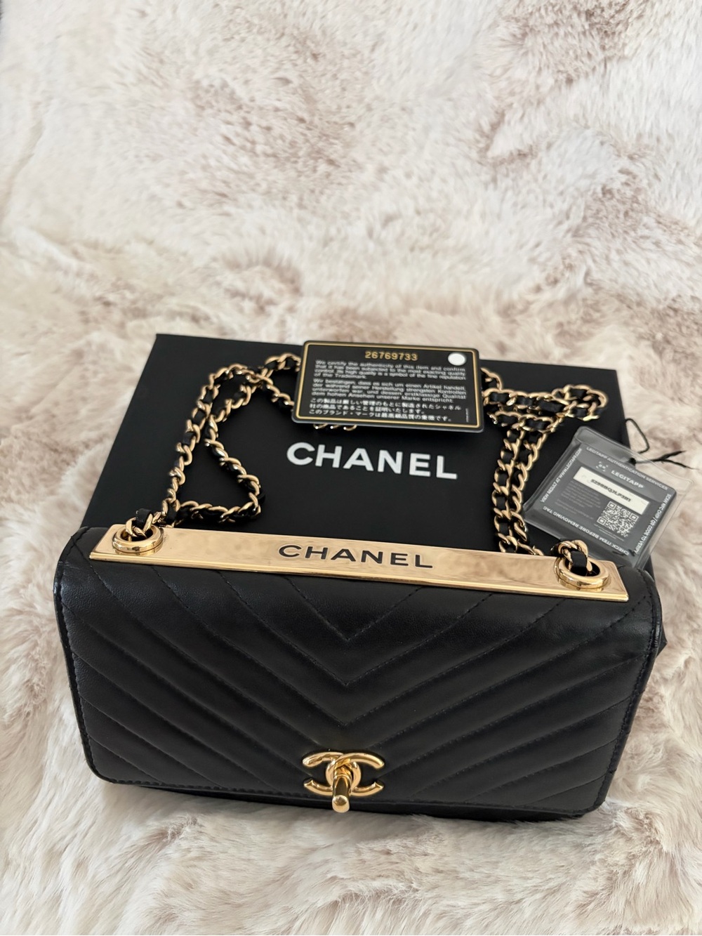 CHANEL Black Chevron Quilted Leather WOC Bag with Gold Plate black card
